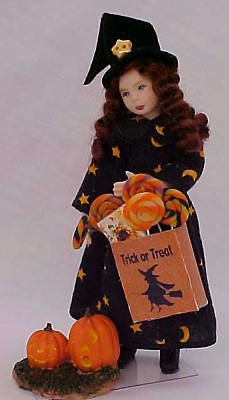 Girl In Halloween Witch Outfit
