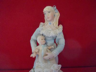 Woman in Blue Dress with Baby