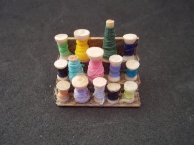 stepped thread holder